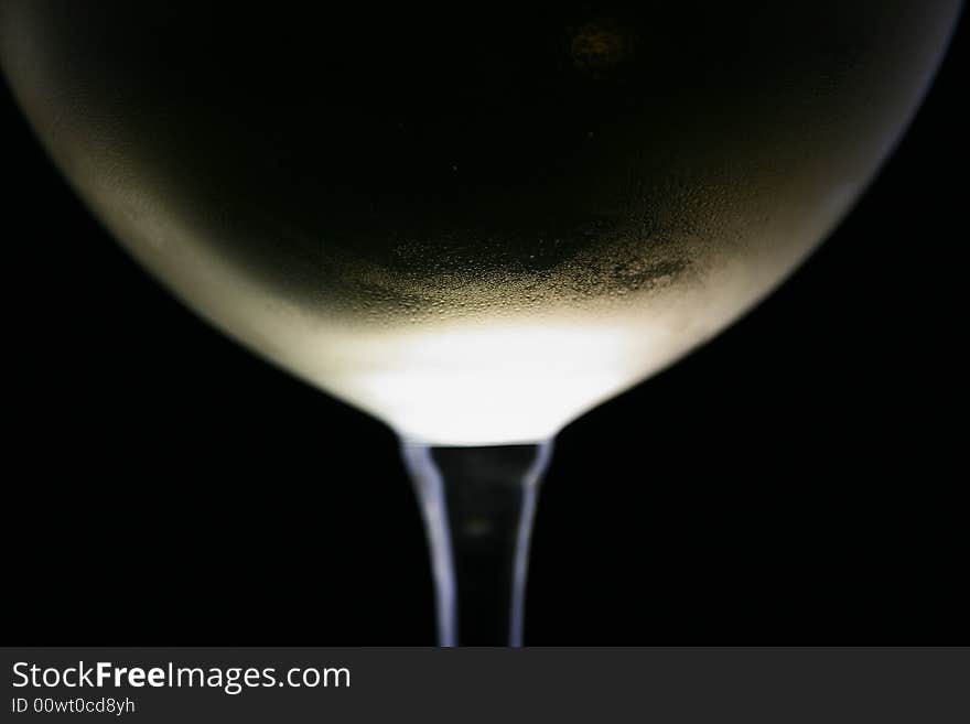 Chilled white wine in a glass. Chilled white wine in a glass