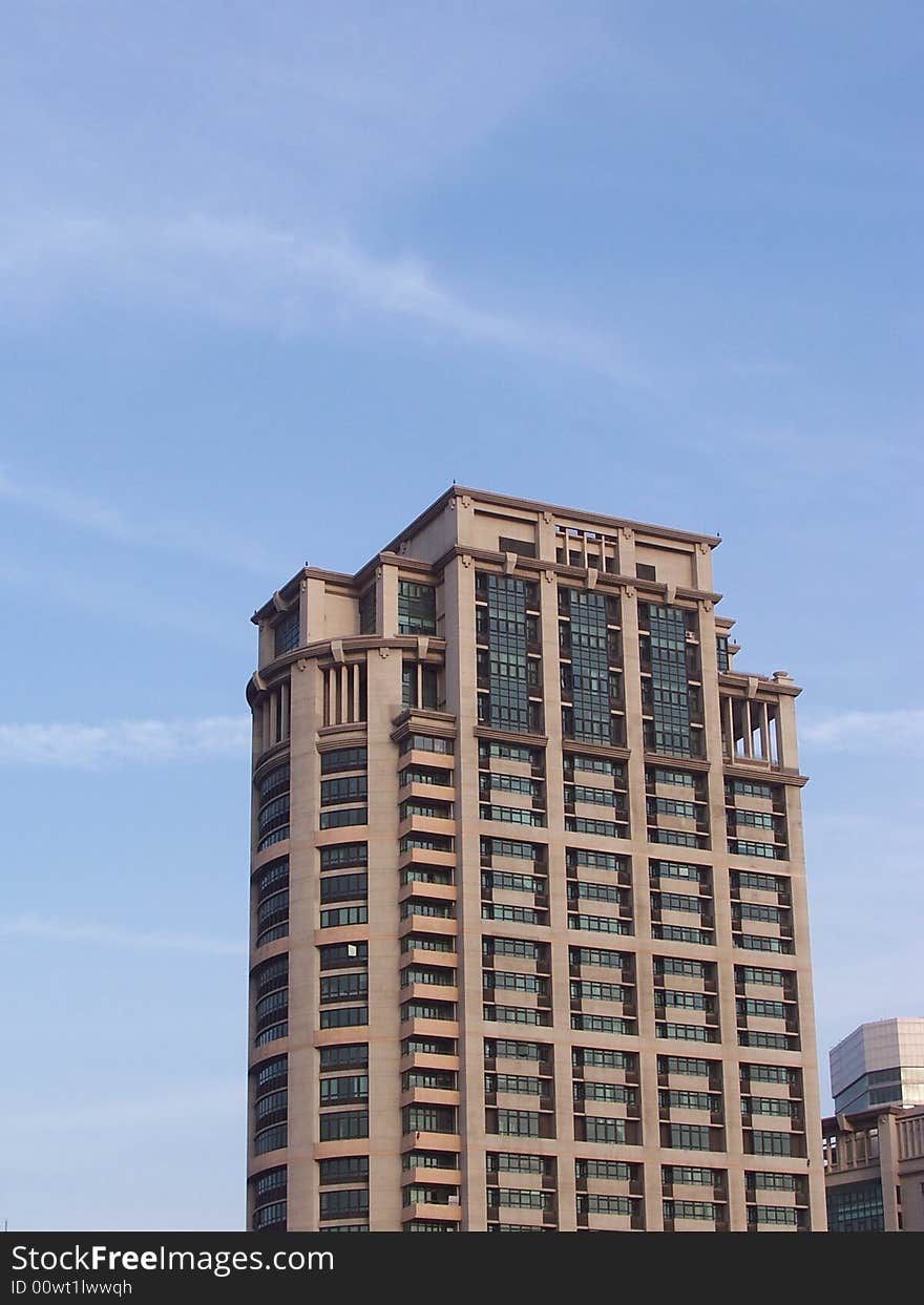 Office building under blue sky