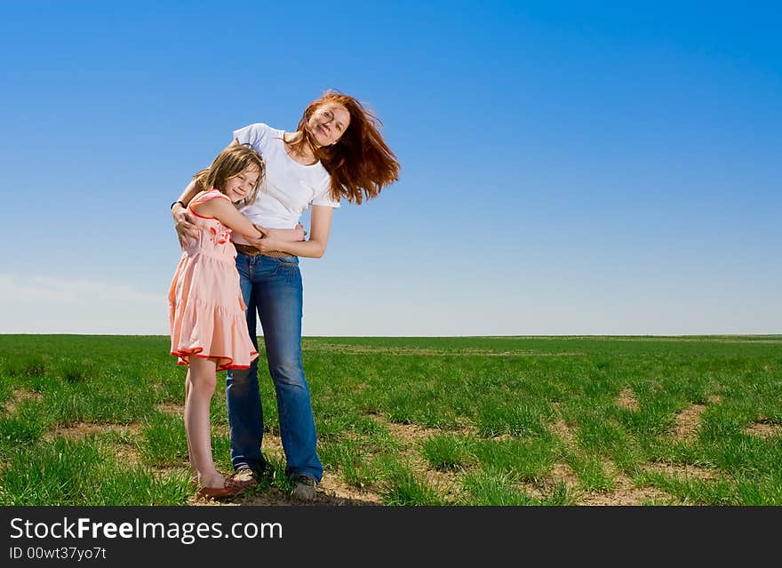 Mother and daughter having a good time together. Mother and daughter having a good time together