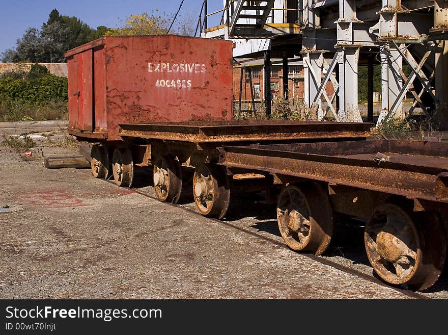 Blyvooruitzicht gold mine carletonville south africa. This image depicts an old and rusted explosives car used to transport explosives underground. This shaft has been decommissioned following the mining of the last gold from the shaft stabilizing pillar, a difficult and dangerous activity