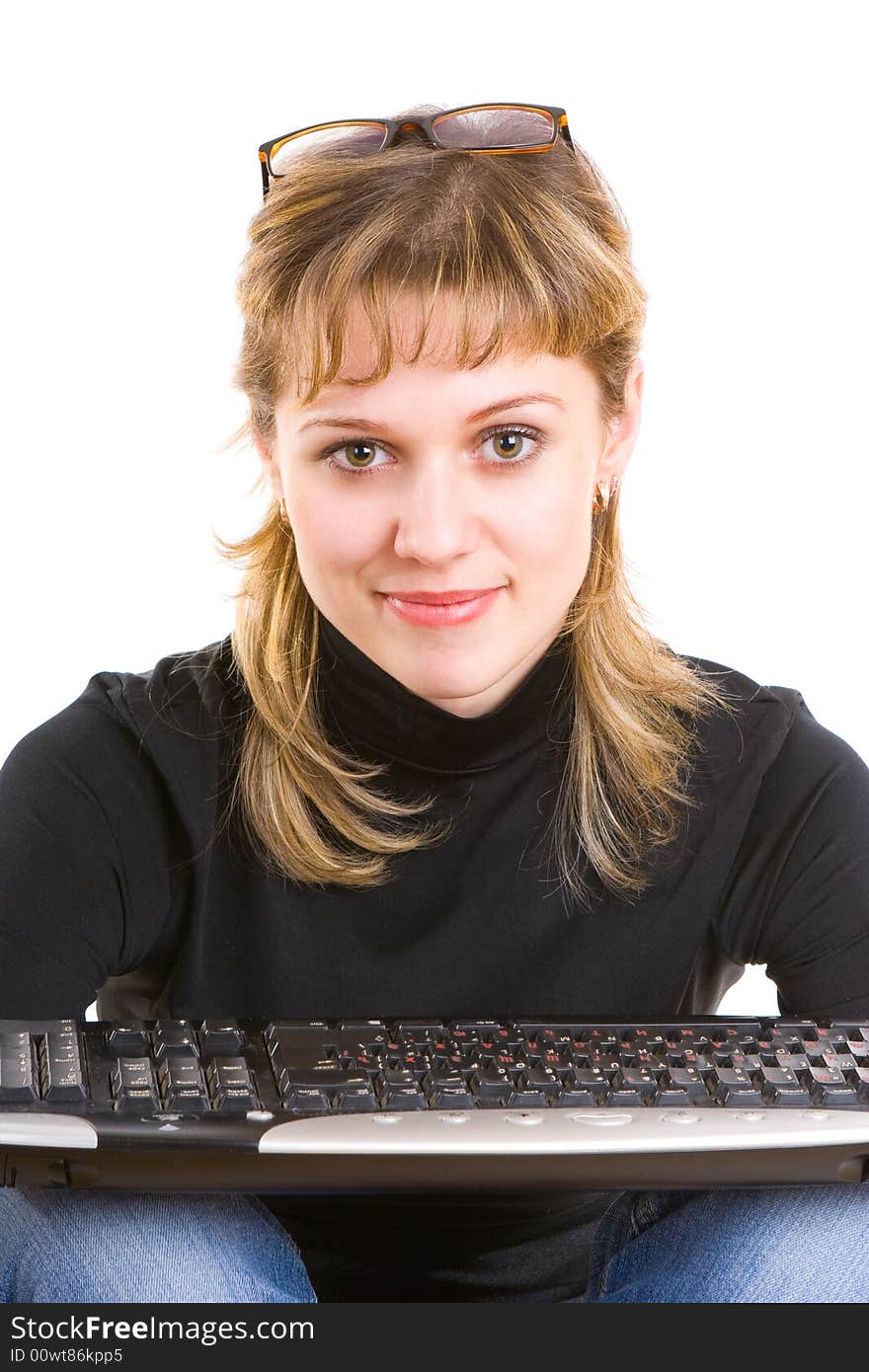 Smiling girl with a keyboard. Smiling girl with a keyboard