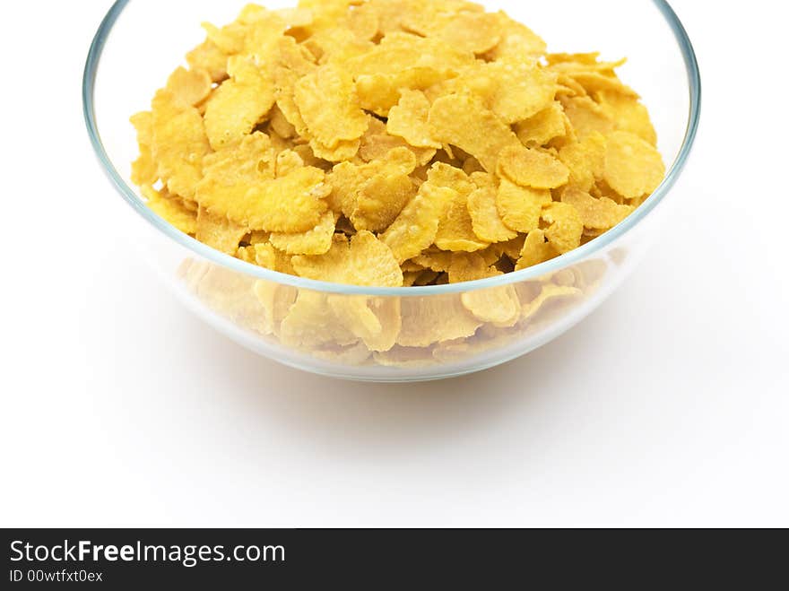 Corn-flakes in a transparent bowl