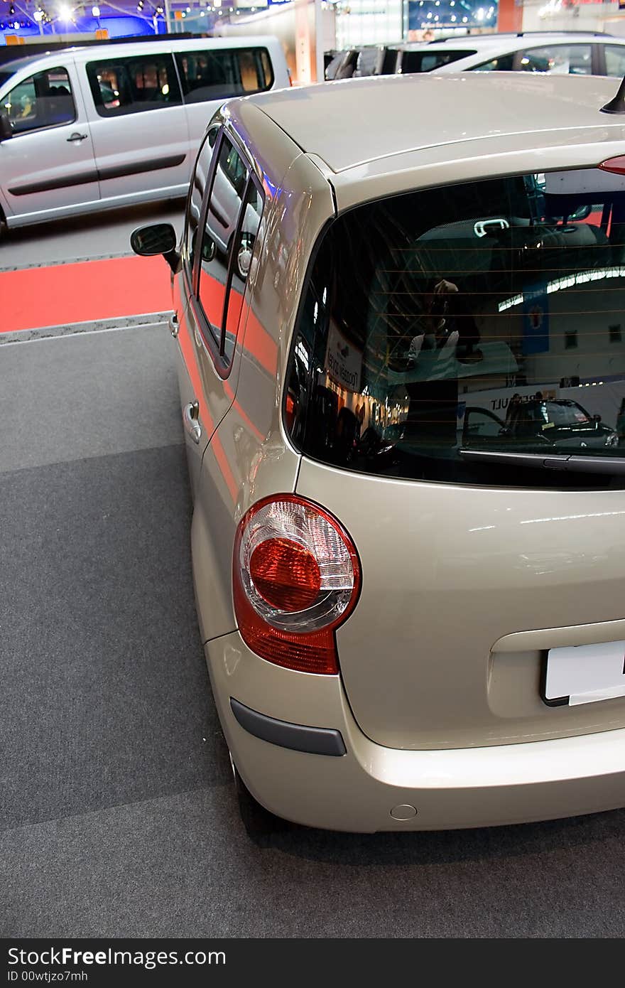 Modern white car (back view) on the flor. Modern white car (back view) on the flor