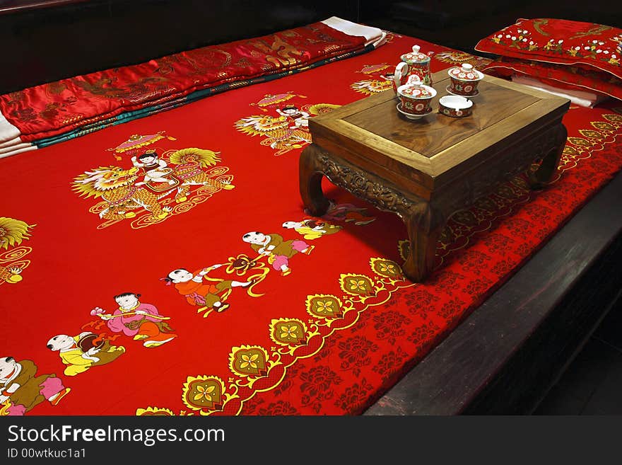 Here is a bed of China's Ming and Qing Dynasties.Arrangement and ornament of the bedroom include very deep Chinese traditional culture. It is Chinese's favorite color to be red, its implied meaning is happy, joyous. Here is a bed of China's Ming and Qing Dynasties.Arrangement and ornament of the bedroom include very deep Chinese traditional culture. It is Chinese's favorite color to be red, its implied meaning is happy, joyous.
