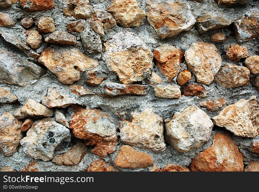 Closeup of stone wall use for construction business and designers. Closeup of stone wall use for construction business and designers