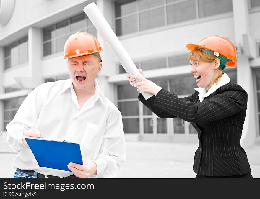 Architects man and woman protective helmet