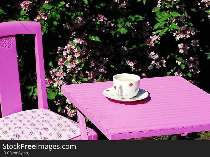 Time for a tea break in the garden in summertime. Time for a tea break in the garden in summertime