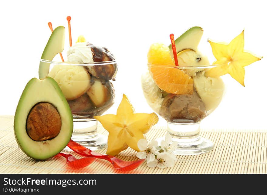 Ice cream with fresh fruits in a bowl close up. Ice cream with fresh fruits in a bowl close up