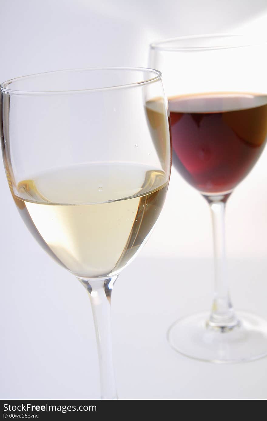 Glasses with white and red wine. Glasses with white and red wine