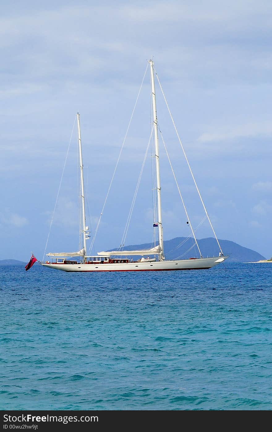 Blue Skies, Clouds, Beach, Yacht on the Sea. Blue Skies, Clouds, Beach, Yacht on the Sea