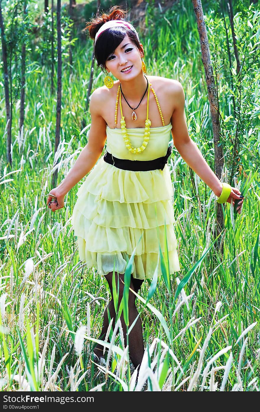 Young gril walk in meadow