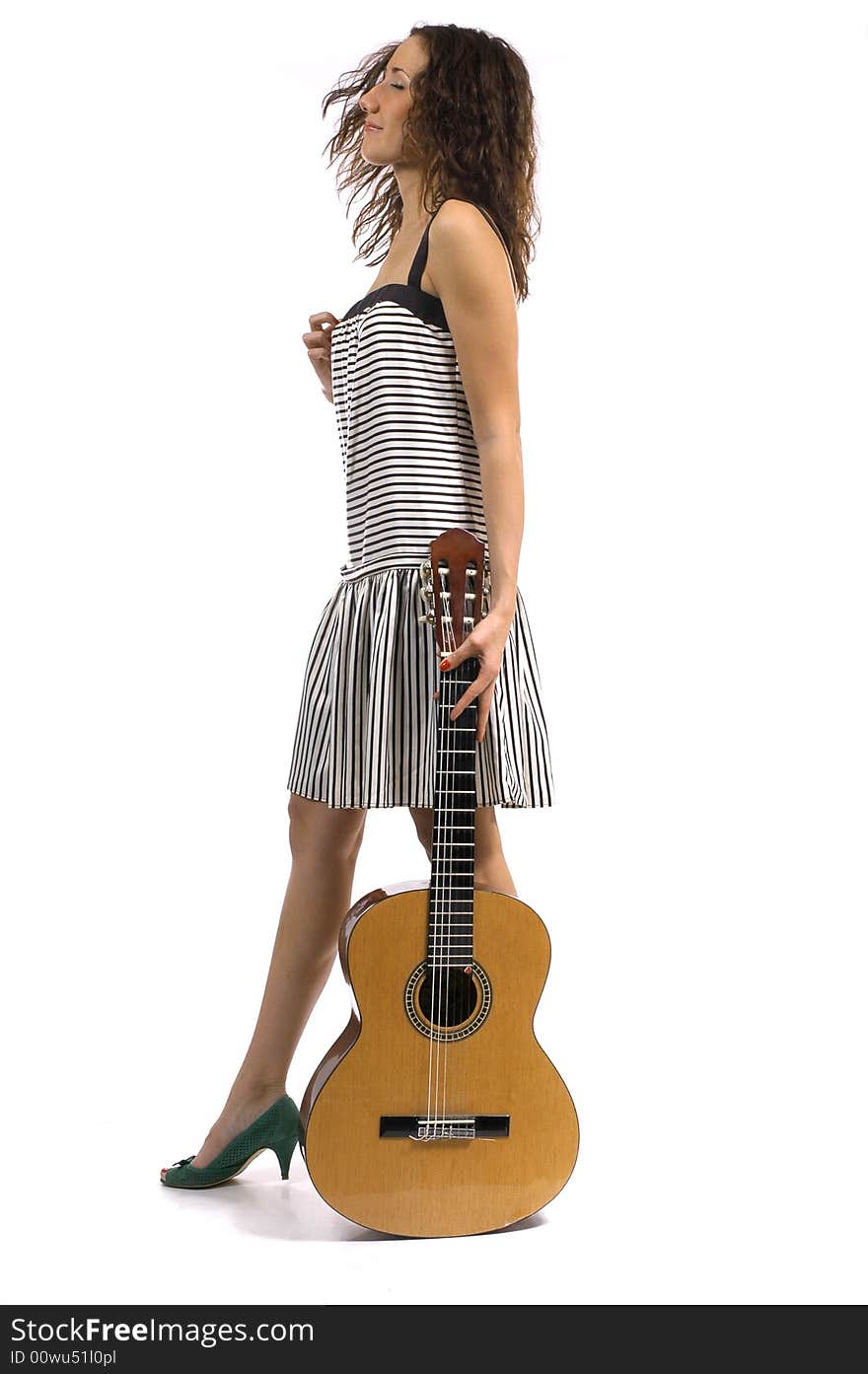 The girl with a guitar on a white background