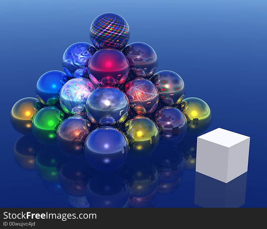 Colourful pyramid made from sphere, and beside the cube