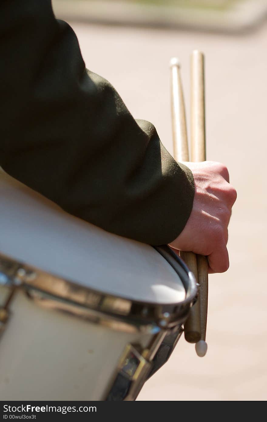 Close-up view of a military drummer�s hand. Close-up view of a military drummer�s hand