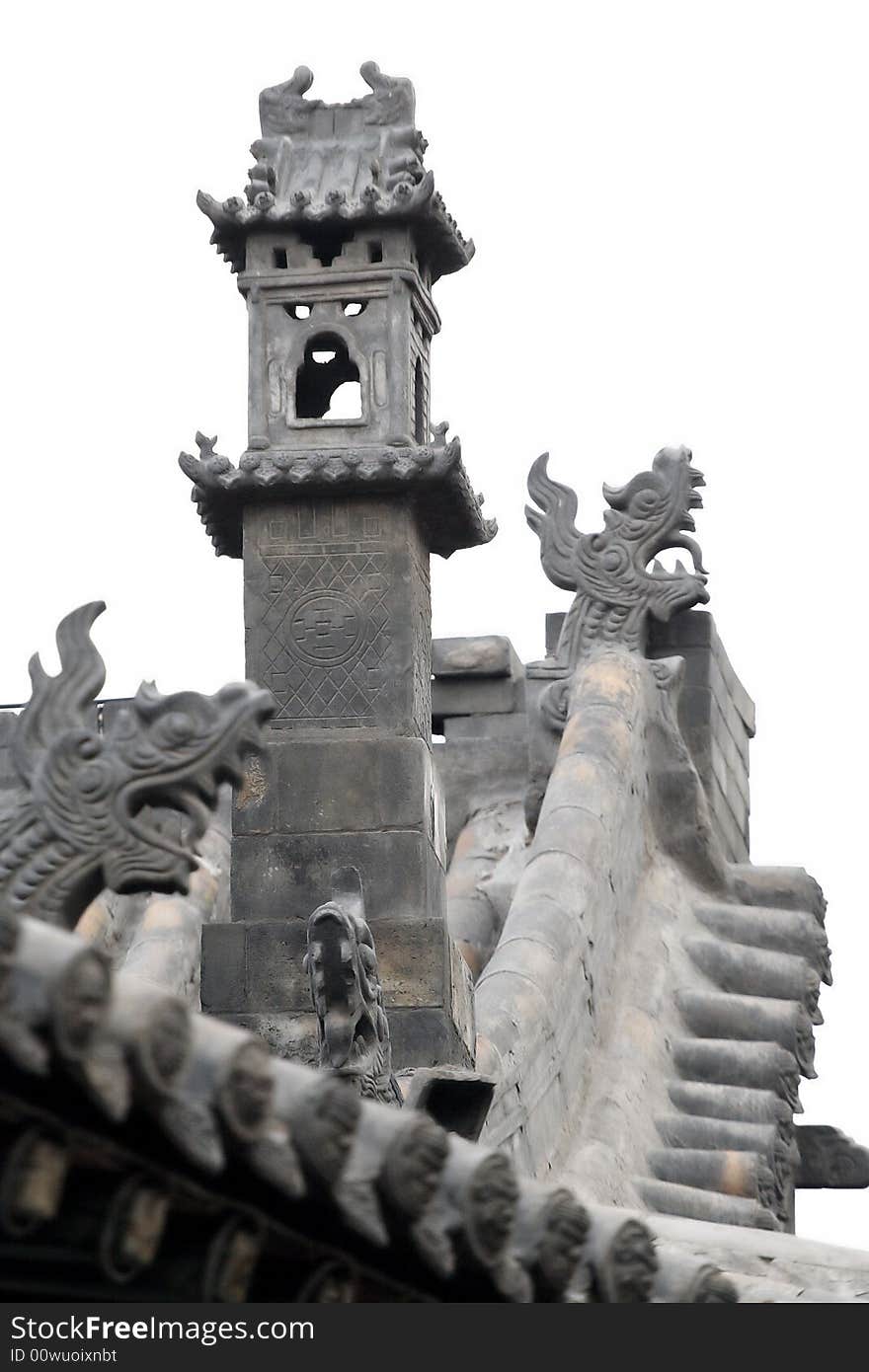 Decorating very exquisite on the Chinese ancient building. Including the eave, the roof,decorating the intension all reflecting Chinese culture of the tile. On the roof in the picture, this upright ornament is the chimney arranging the smoke in the Chinese ancient building. Picture PS hour, adjusts color. Make every effort to stress the historical sense!. Decorating very exquisite on the Chinese ancient building. Including the eave, the roof,decorating the intension all reflecting Chinese culture of the tile. On the roof in the picture, this upright ornament is the chimney arranging the smoke in the Chinese ancient building. Picture PS hour, adjusts color. Make every effort to stress the historical sense!