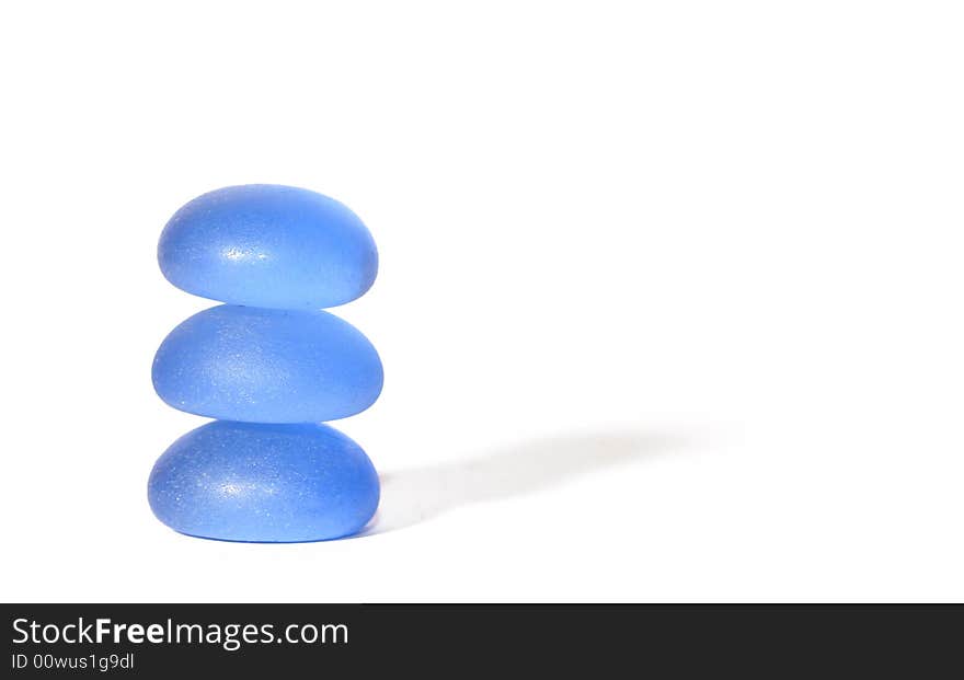 Three glass stones piled up to a tower