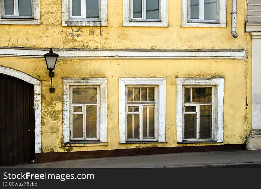 Old wall of house with a  in Europe