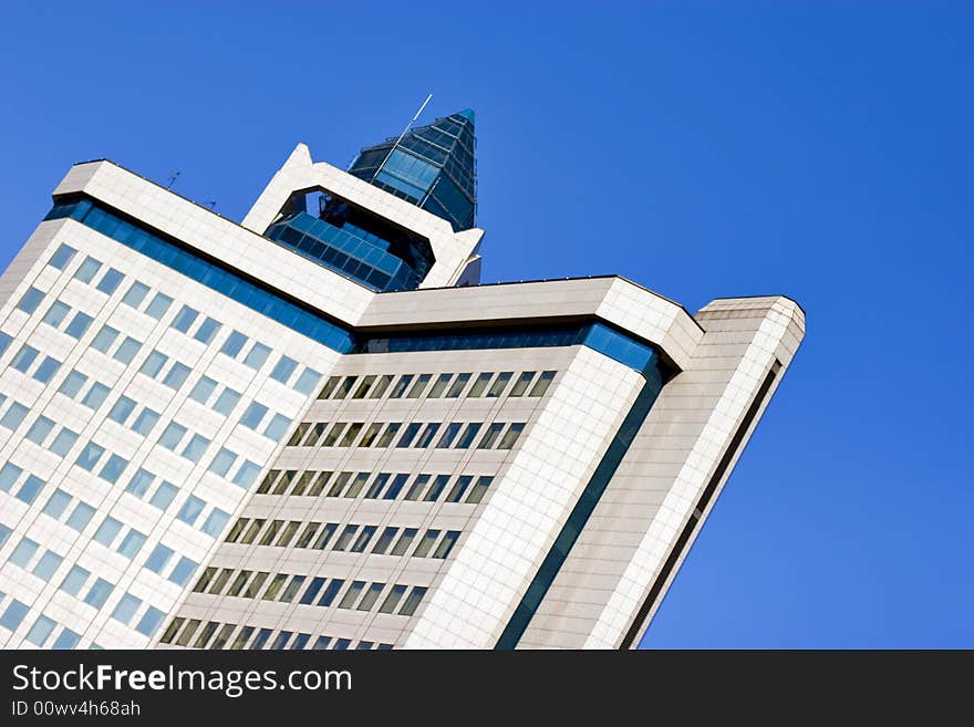 High-rise house on blue sky background