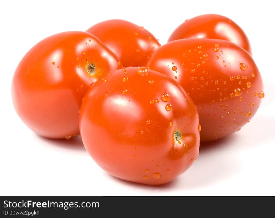 Fresh tomatoes with waterdrops.