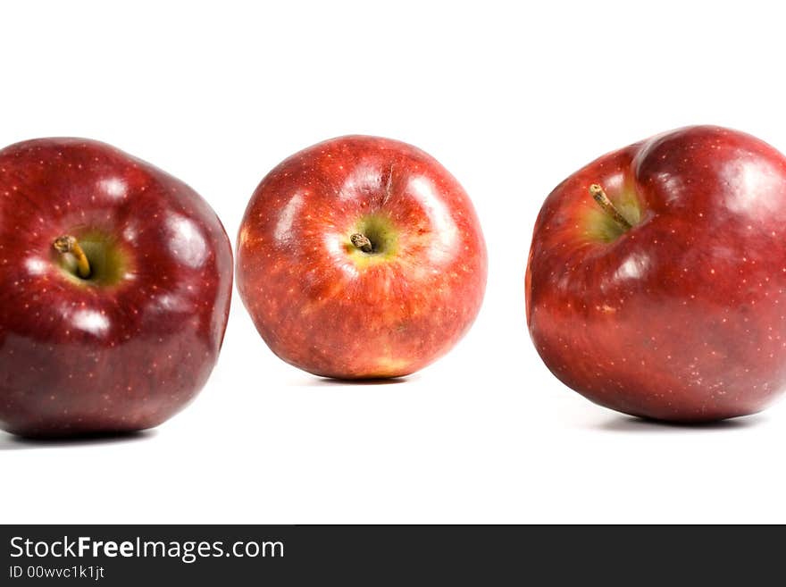 Fresh red apples isolated on a white background