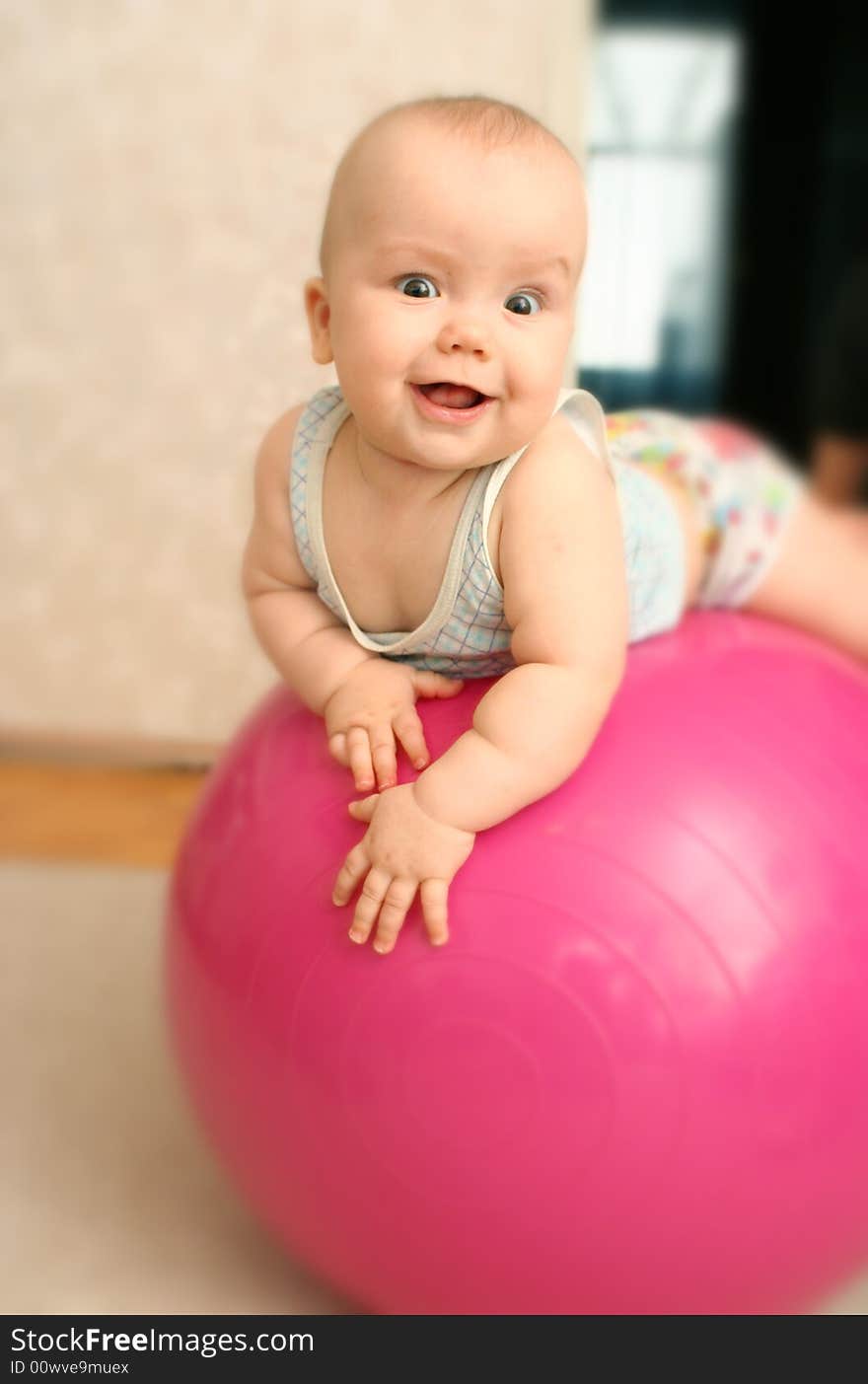 The Joyful Child On A Ball