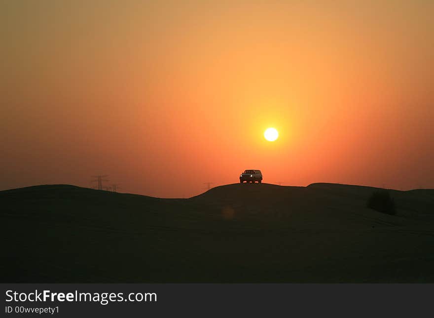 Traveling in Desert During Sunset