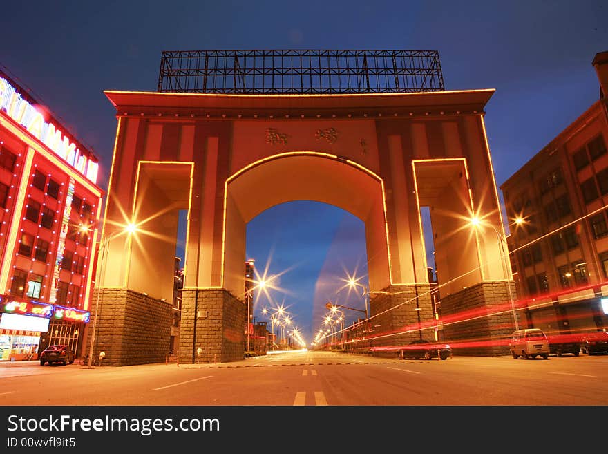 Car through gate at night in shanghai