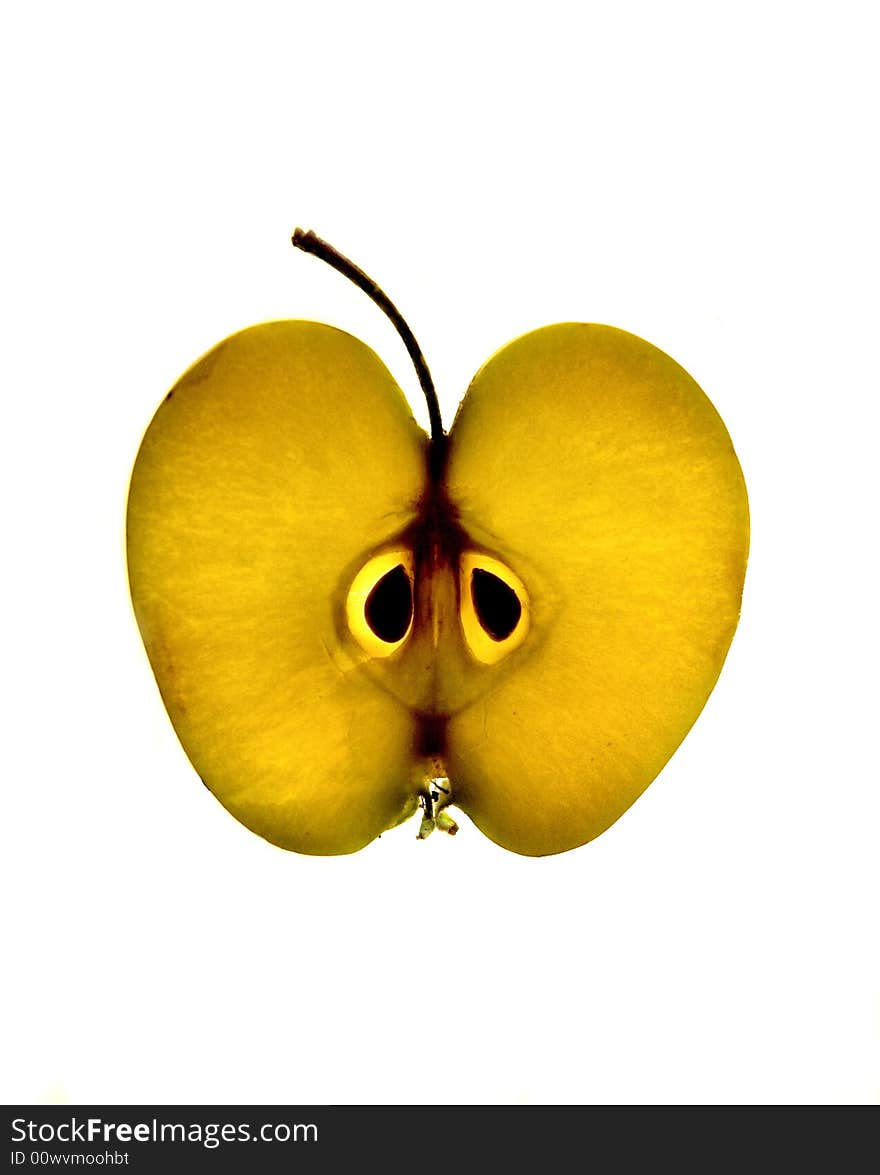 Lobule of yellow apple on a white background. Lobule of yellow apple on a white background