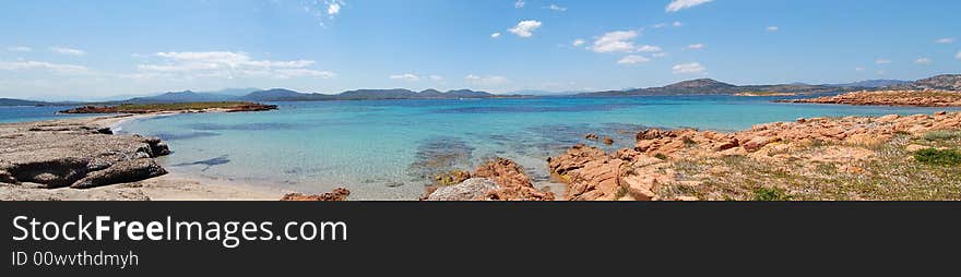 A view of Tavolara Beach in Sardinia. Tavolara is a little but important island on the coast of Sardinia, in front Olbia & Porto San Paolo. 
This island is a good place to see nature & animals. A view of Tavolara Beach in Sardinia. Tavolara is a little but important island on the coast of Sardinia, in front Olbia & Porto San Paolo. 
This island is a good place to see nature & animals.