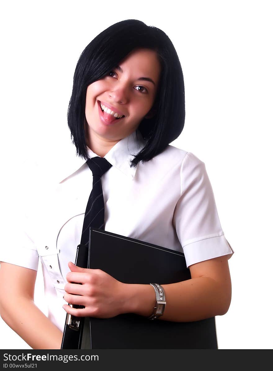 A portrait about a young pretty happy businesswoman with black hair who is holding some folders at the office, she is sticking out her tongue and she is wearing a white shirt and a black tie. A portrait about a young pretty happy businesswoman with black hair who is holding some folders at the office, she is sticking out her tongue and she is wearing a white shirt and a black tie