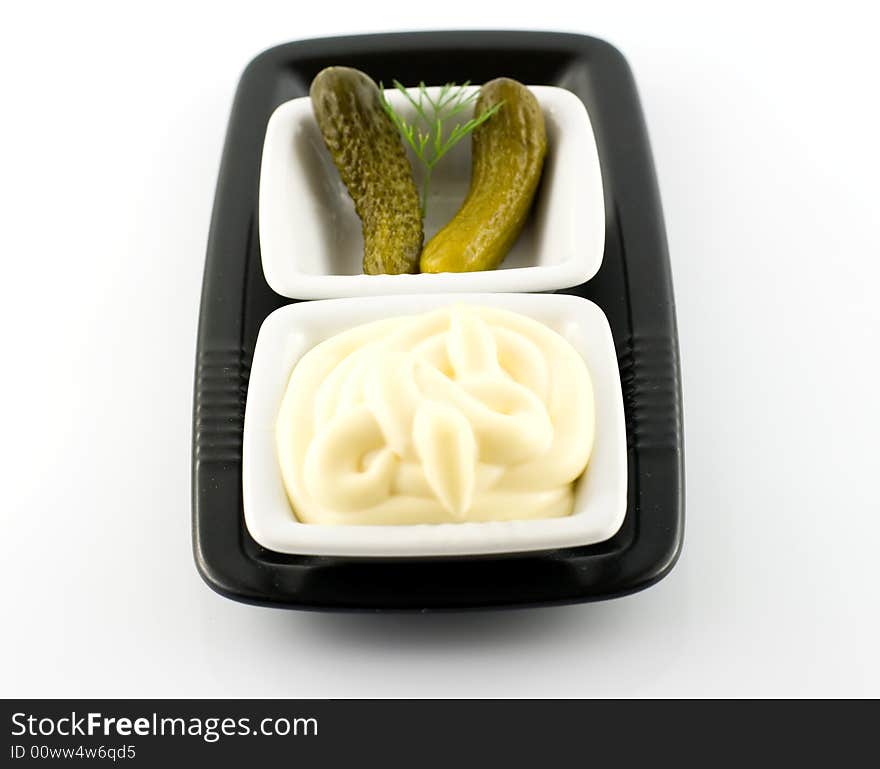 Mayonnaise and pickled gherkin and dill