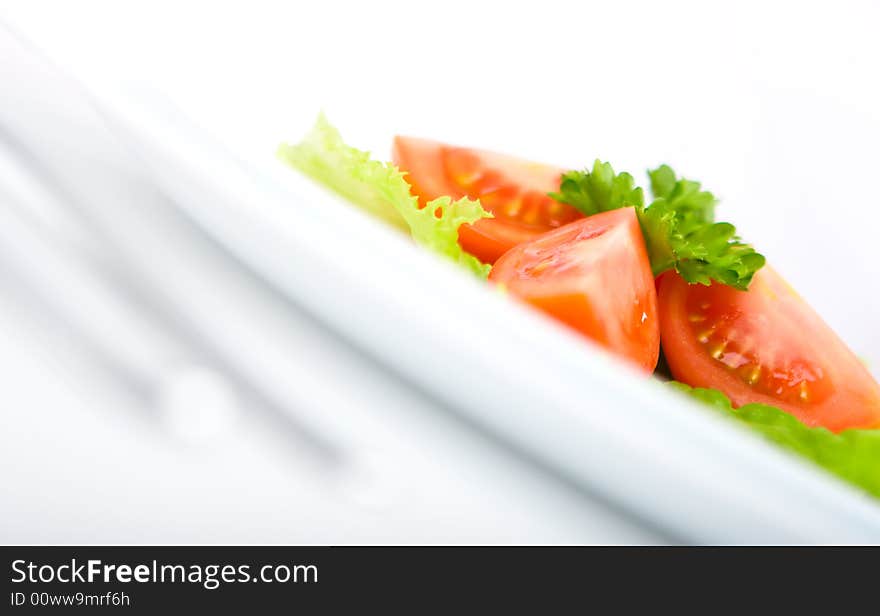 Italian salad with tomato close up