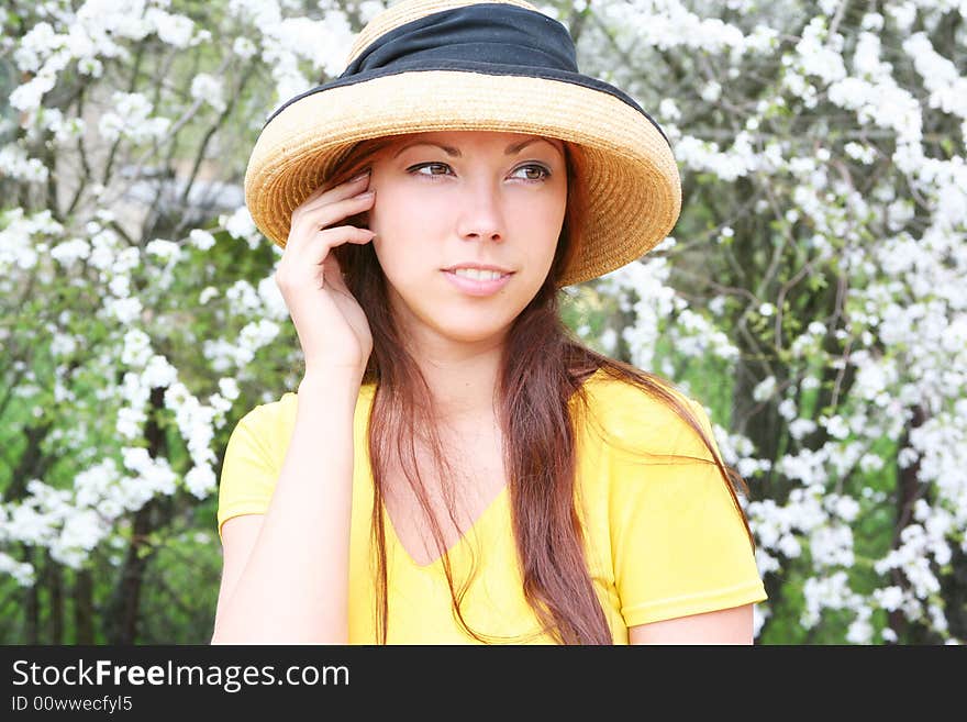 Young beautyful girl in the garden. Young beautyful girl in the garden