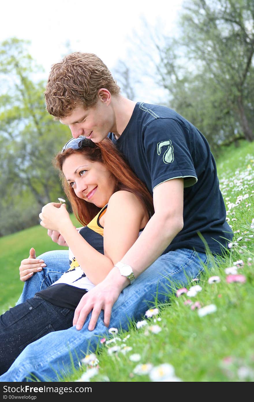 Happy couple is relaxing outdoors. Happy couple is relaxing outdoors