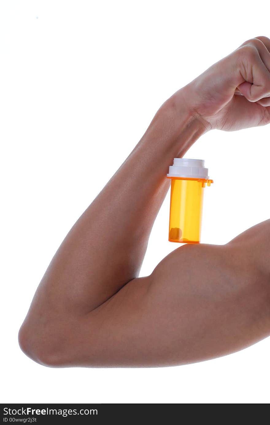 Muscular arm holding a bottle of pills. Muscular arm holding a bottle of pills