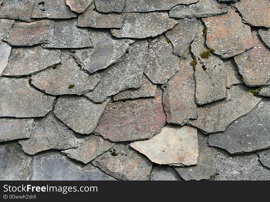 A background of stones of a roof. A background of stones of a roof.