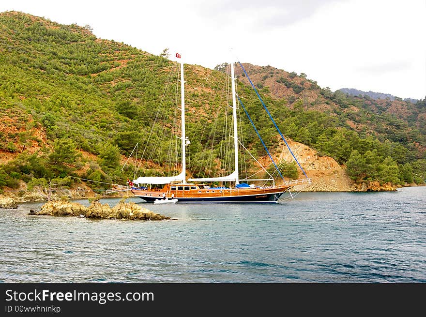 Beautiful marine landscape with yacht in bay