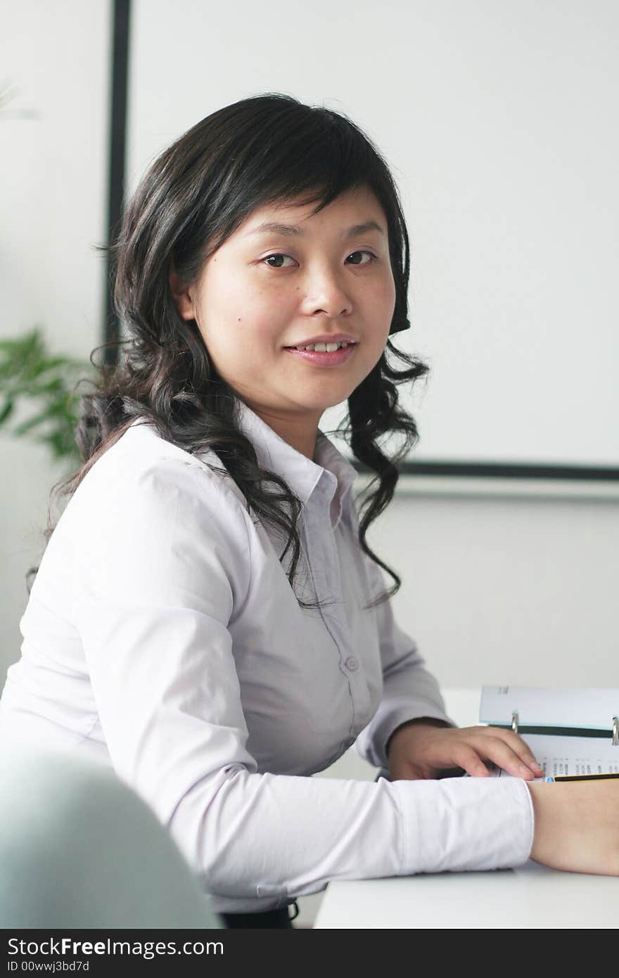 Young Asian Women In Meeting Room