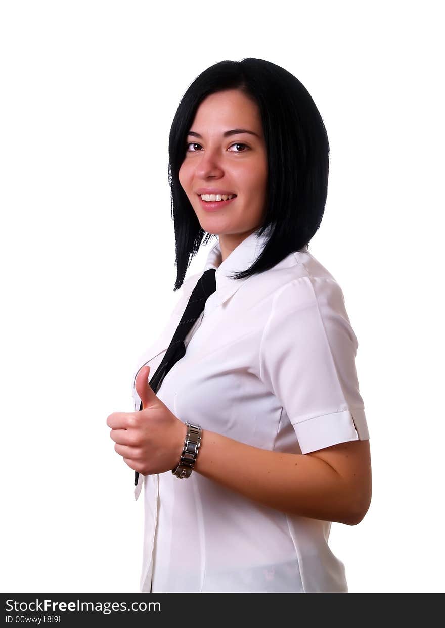 A portrait about a young pretty happy businesswoman with black hair who is giving the thumbs up and she is wearing a white shirt and a black tie. A portrait about a young pretty happy businesswoman with black hair who is giving the thumbs up and she is wearing a white shirt and a black tie