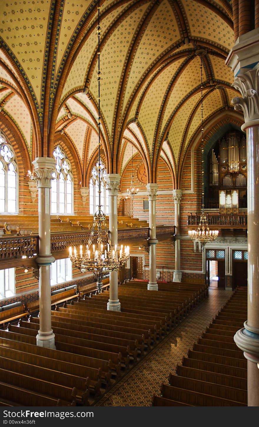 Inside of a church with a view of its pipe organ (Lund, Sweden)