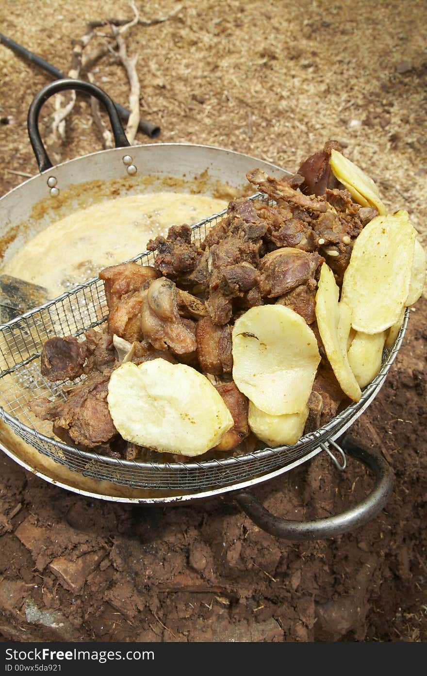 Chicharron, deep fried pork, and potatoes in the Peruvian Andes. Chicharron, deep fried pork, and potatoes in the Peruvian Andes.