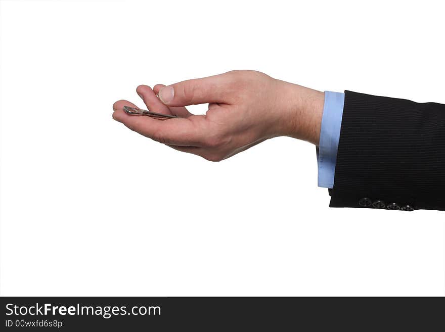 Cropped shot of human hand in black suit holding out house keys