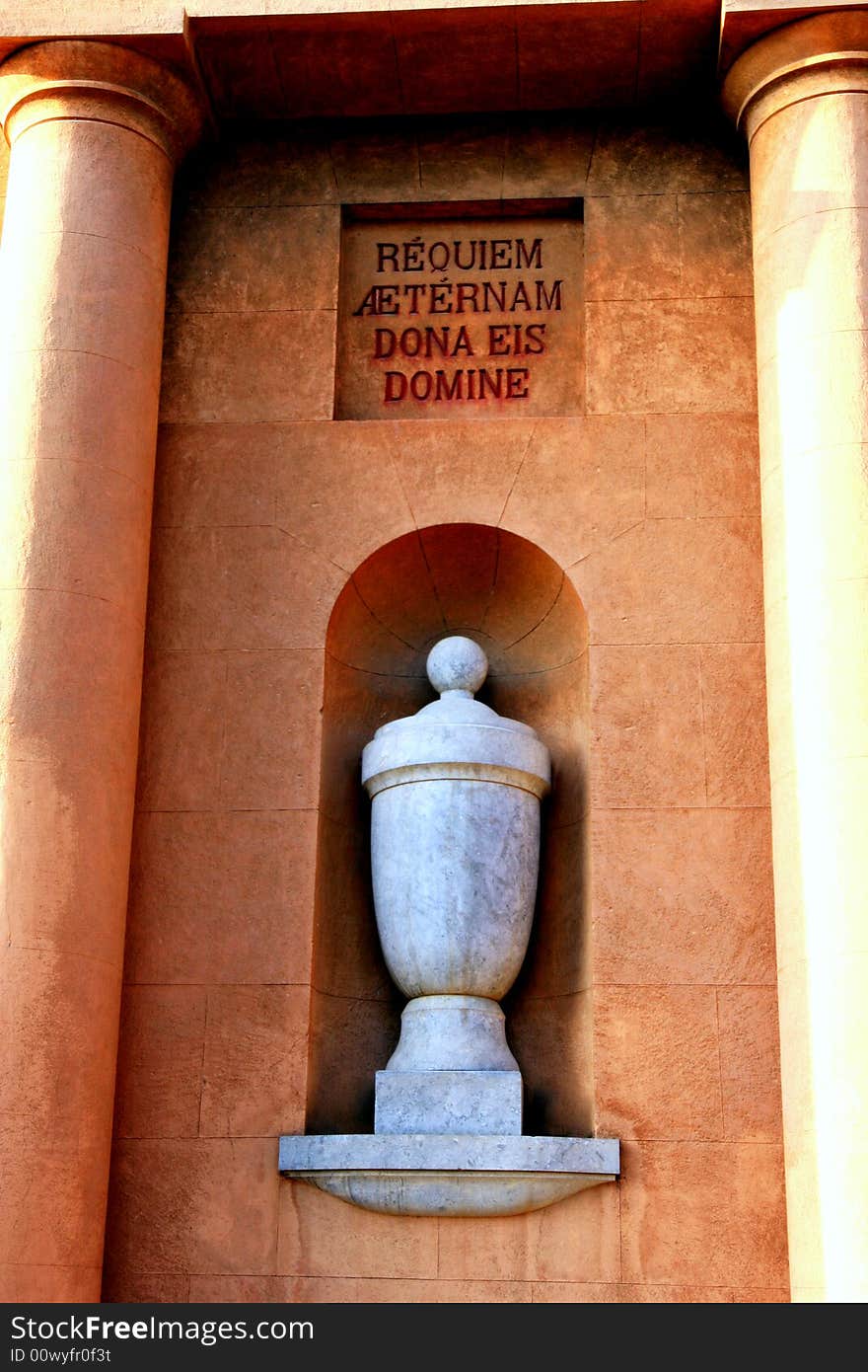 Cemetery entrance front façade, wuth sculpted cirerary vases. Christianity, religiorn and death. 
Island of Sicily - Italy. Cemetery entrance front façade, wuth sculpted cirerary vases. Christianity, religiorn and death. 
Island of Sicily - Italy