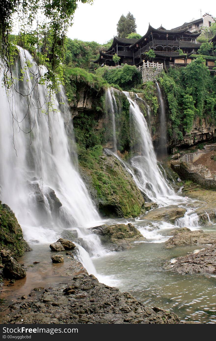 Waterfall beside an ancient town