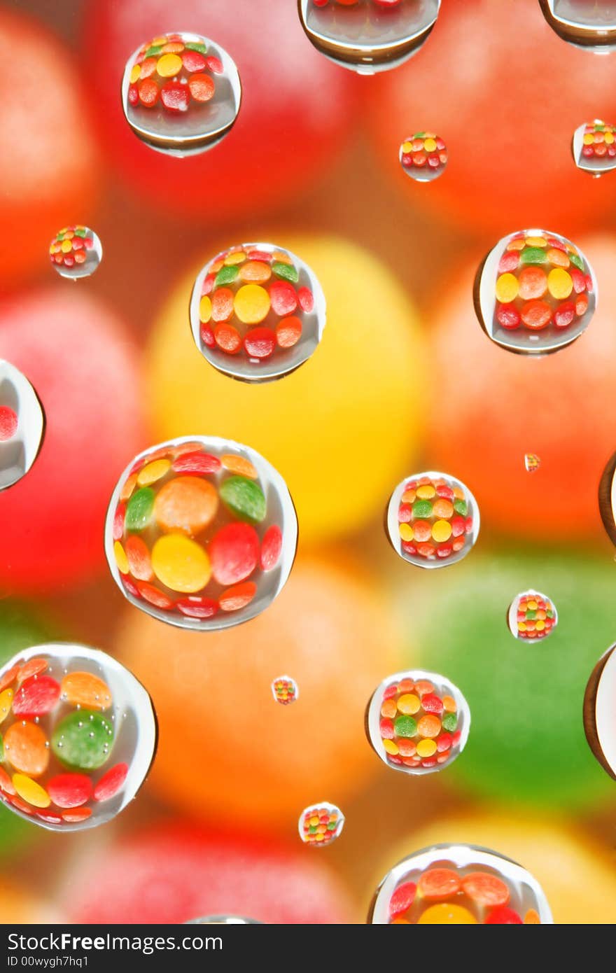 Abstract background, selective focus on candy reflected in droplets. Abstract background, selective focus on candy reflected in droplets