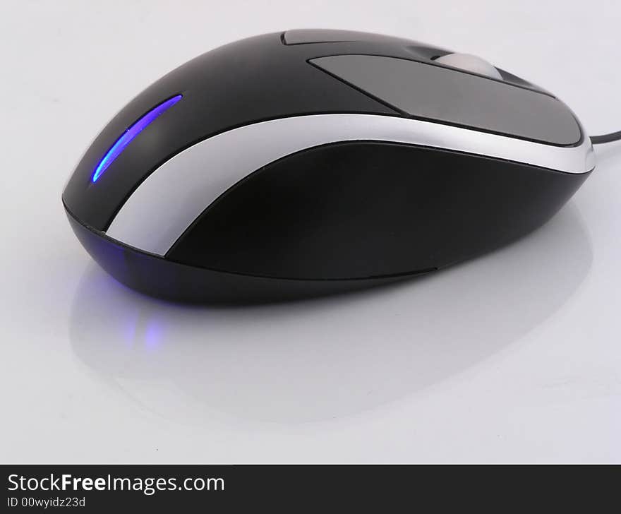 Computer mouse with one blue eye