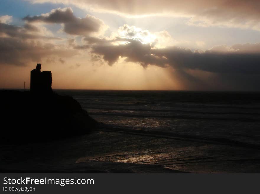 A castle in a west of ireland storm on its cliffs in ballybunion. A castle in a west of ireland storm on its cliffs in ballybunion