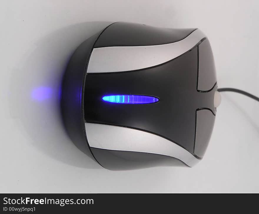 Computer mouse with one blue eye