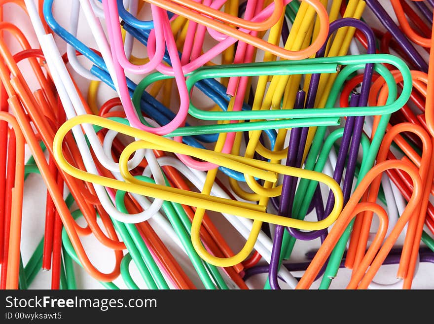 Colorful paperclips shot close up filling the frame. Colorful paperclips shot close up filling the frame