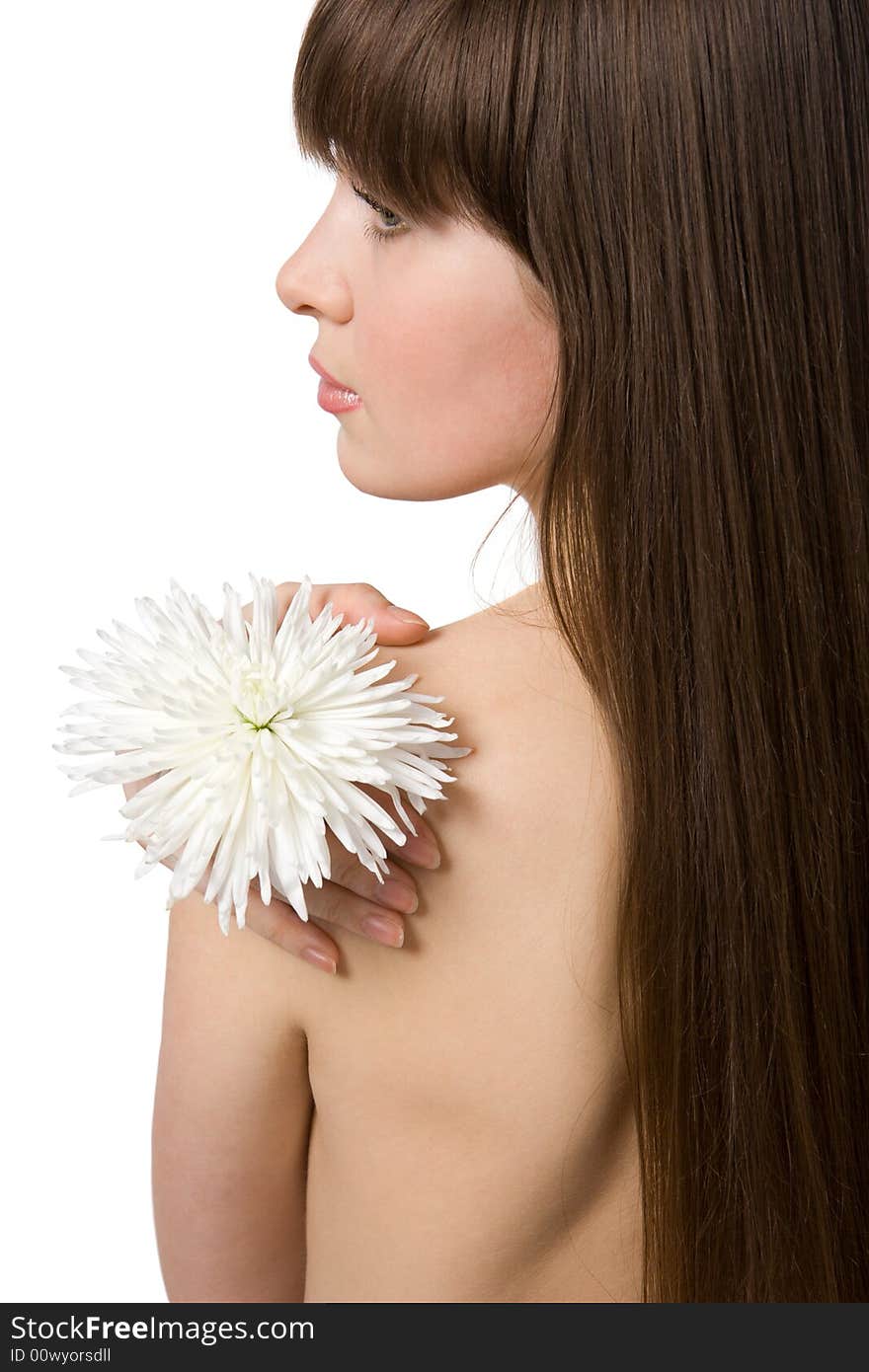 Naked attractive brunette with chrysanthemum